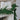 Christmas mantel decor with a soft-touch conifer garland draped across a fireplace