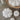White ceramic pumpkins on a coffee table 